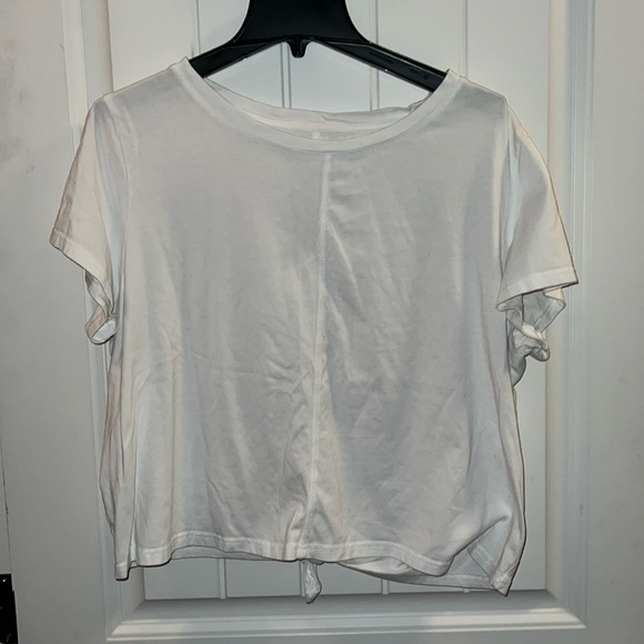 Dip short sleeve crop top with tie in back. No stains or holes. - Picture 1 of 3